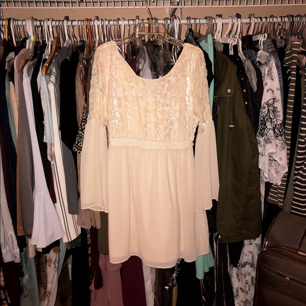 Cream shirt (Or a short dress)